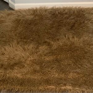 Cynthia Rowley Tan Fluffy Rug                       65 inches x 50 inches.
